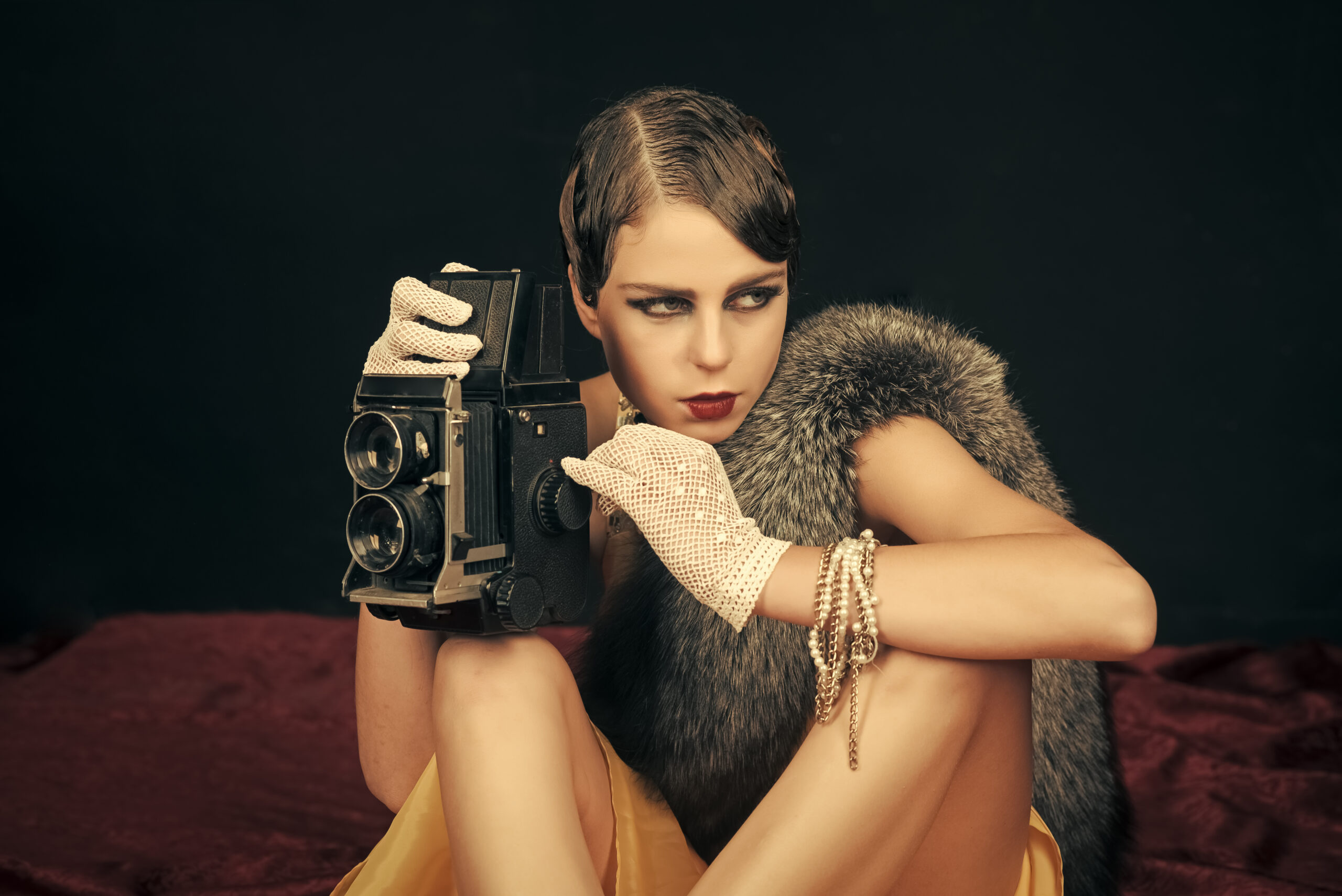 Woman,With,Retro,Hair,,Makeup,And,Old,Camera.,Beauty,,Retro